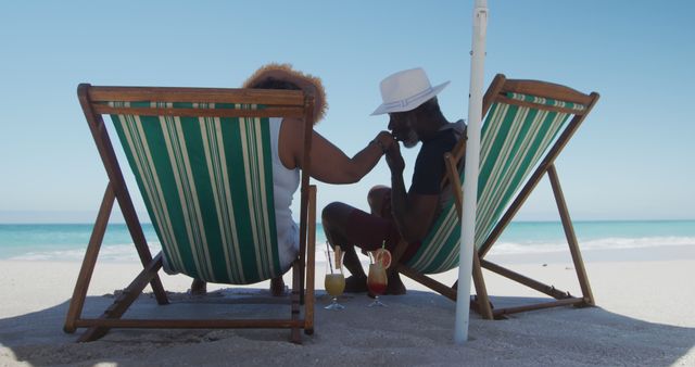 Romantic Couple Relaxing on Beach with Drinks - Download Free Stock Images Pikwizard.com