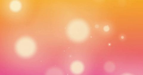 Warm Glowing Light Spots on Orange Background