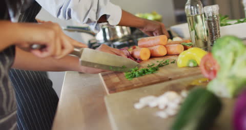 Diverse Friends Enjoy Cooking and Bonding at Home