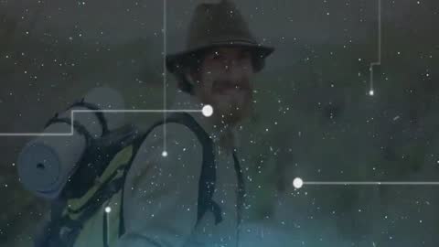 Male Adventurer with Futuristic Digital Overlay on Scenic Trail