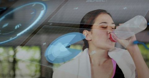 Hydrated woman drinking with holograms and fitness technology