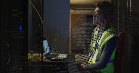 Data Engineer Analyzing Network Connections in Server Room