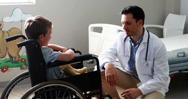 Male doctor interacting with child patient in ward at hospital - Download Free Stock Photos Pikwizard.com
