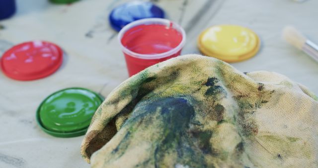 Close-up of Paint Pots and Dirty Cloth in Painting Studio - Download Free Stock Images Pikwizard.com