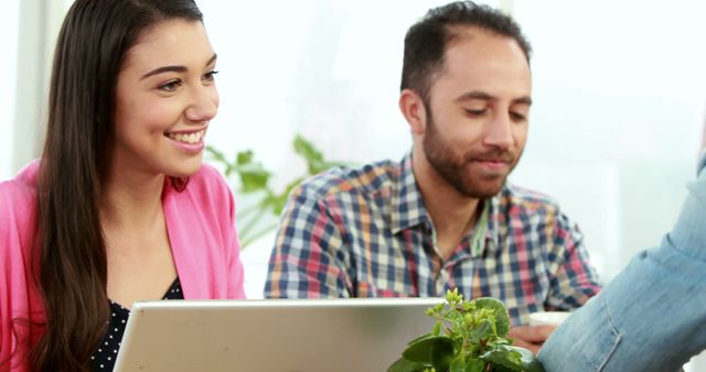 Smiling Team Members Collaborating in Modern Office - Download Free Stock Images Pikwizard.com