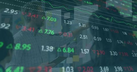 Professionals Collaborating on Stock Market Strategy in Conference