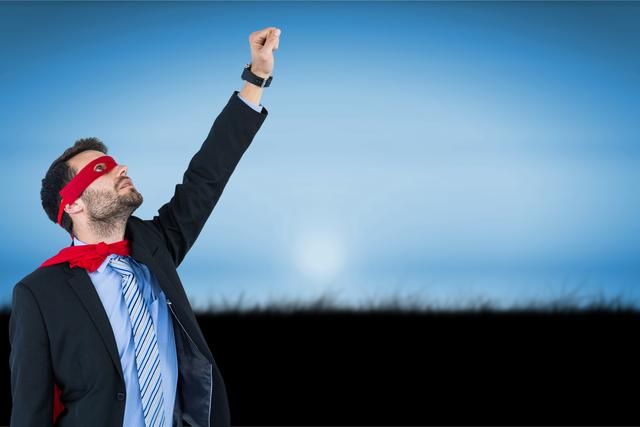 Digital composite of Businessman in superhero costume raising hand to fly