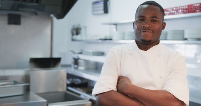 Confident Male Chef Standing in Modern Restaurant Kitchen - Download Free Stock Images Pikwizard.com