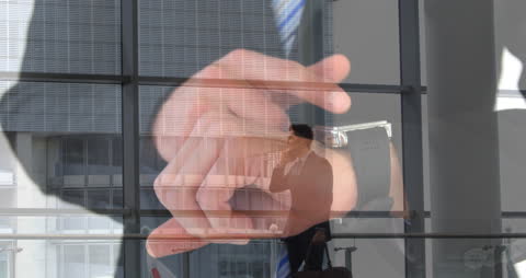 Businessman Using Smartphone Overlaying Technology Concept