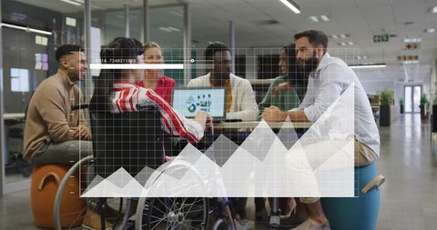 Multiracial Colleagues Discussing Data Insights in Modern Office Setting - Download Free Stock Images Pikwizard.com