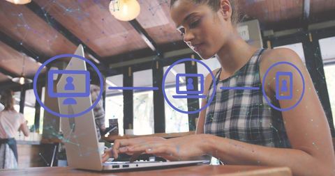 Biracial Woman Using Laptop with Digital Network Interface Overlay - Download Free Stock Images Pikwizard.com
