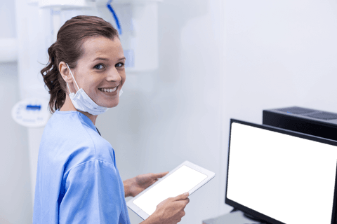 smiling dental assistant with tablet in transparent mask setting - Download Free Stock Videos Pikwizard.com