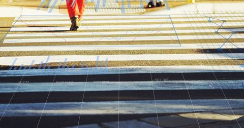 Urban crosswalk with data overlay illustrating movement and technology
