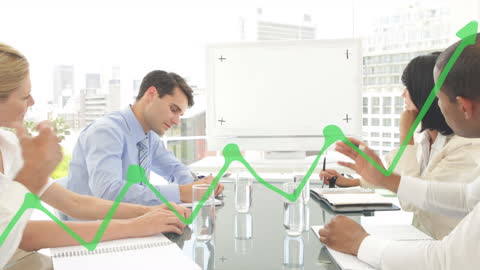 Business Team Analyzing Growth With Interactive Graph in Modern Office