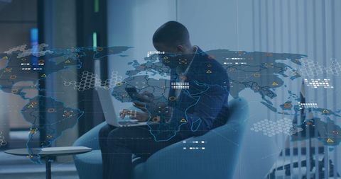 Global Businessman Using Smartphone in Modern Workspace