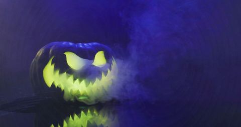 Glowing Jack-o'-Lantern with Smoke Mystifying Atmosphere - Download Free Stock Images Pikwizard.com