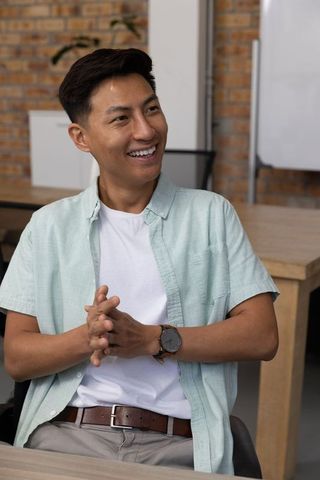 Smiling Professional Collaborating in Modern Workspace