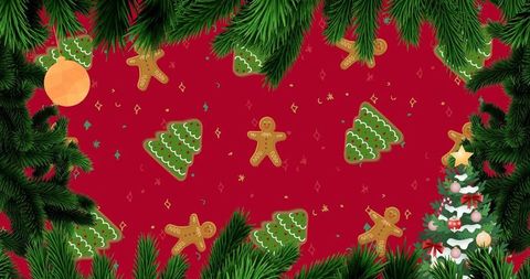 Christmas pine wreath framing red holiday background with gingerbread cookies and ornaments