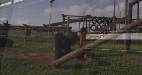 Athlete Crawling Under Beam with Coding Overlay for Fitness Drive