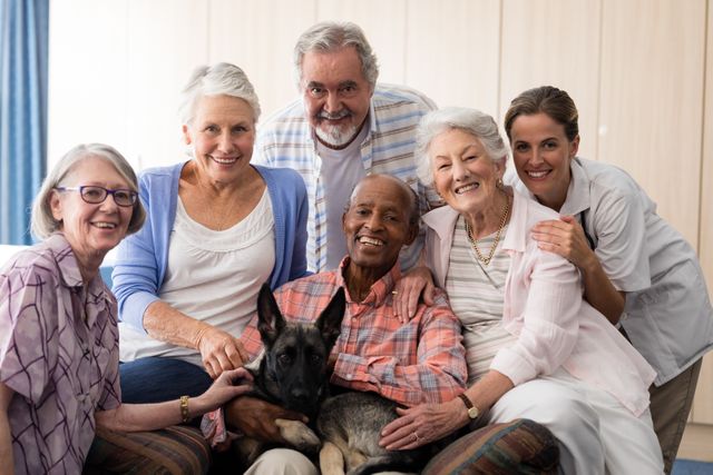 Group of seniors and a doctor smiling together with a dog at a nursing home. This image can be used for promoting elderly care services, highlighting the importance of companionship and pet therapy in senior living, or illustrating healthcare and retirement community environments.