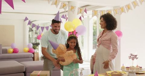 Joyful Birthday Celebration with Family and Balloons at Home