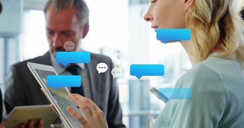 Woman communicating on smartphone with chat bubbles illustrating online interaction