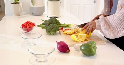 Preparing Fresh Vegetables for Healthy Meal in Modern Home Kitchen