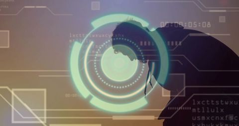 Businessman silhouette studying holographic cyan HUD interface in futuristic virtual studio