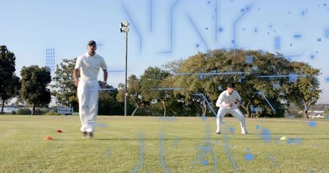 Cricket players training on grass field running and crouching with cones and tech overlay