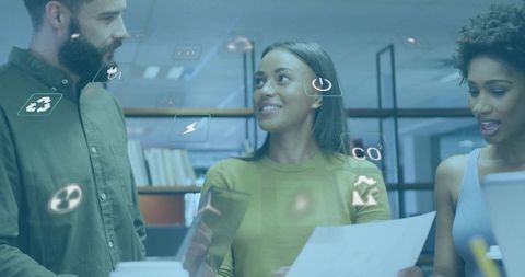 Eco-conscious Office Team Collaborating on Technology Project