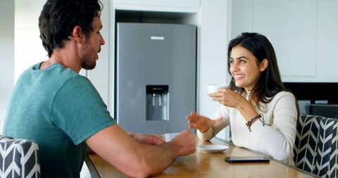 Diverse Friends Enjoying Coffee in Cozy Kitchen