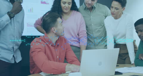 Team Collaborating on Data Analysis with Digital Interface