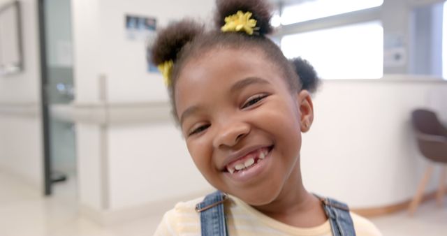 Joyful Girl Smiling in Hospital Waiting Room - Download Free Stock Images Pikwizard.com