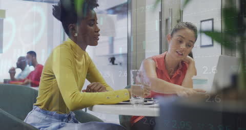 Collaborative Multiracial Teamwork in Modern Office with Technology Integration