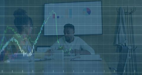 Colleagues Analyzing Data with Digital Interface Overlay