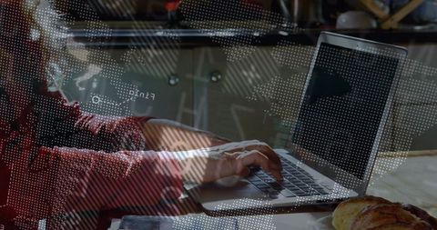 Balanced lifestyle: remote work in a cozy home kitchen environment