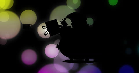 Silhouette of Santa Claus on Sleigh with Colorful Bokeh Background