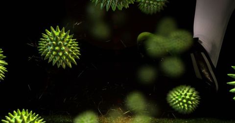 Conceptual Image of Rugby with Floating Virus Particles