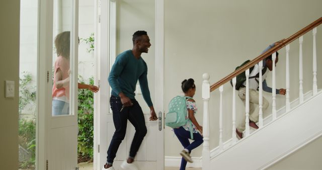 Family Entering Home Excitedly After School - Download Free Stock Images Pikwizard.com