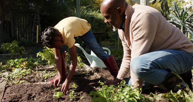 Father and Child Gardening Together Outdoors - Download Free Stock Images Pikwizard.com