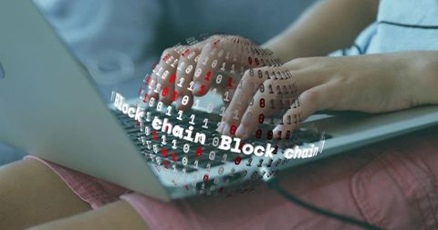 Typing on laptop with holographic blockchain globe, binary code sphere and digital ledger