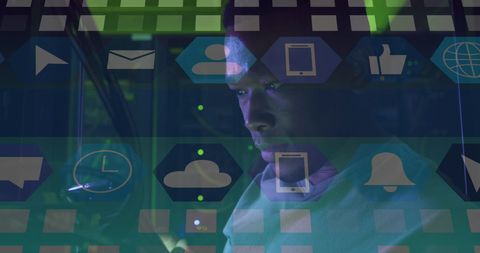 Tech Worker in Server Room Overlaid with Digital Icons - Download Free Stock Images Pikwizard.com