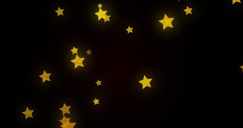 Glowing Golden Stars Moving on Black Background - Download Free Stock Images Pikwizard.com