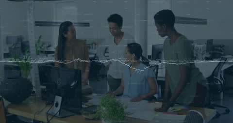 Diverse Team Analyzing Data with Digital Interface in Modern Office