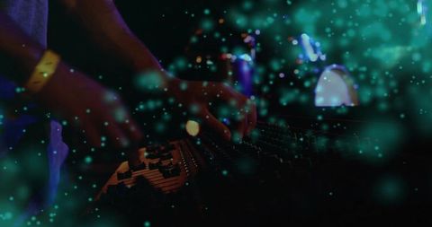 Nightclub Soundboard Hands Adjusting Audio Faders and Knobs with Teal Bokeh Lighting