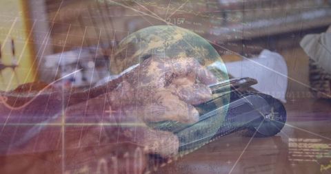 Senior Engaging with Digital Technology in Modern Workspace