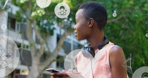 Woman with Headphones and Smartphone in Network Concept