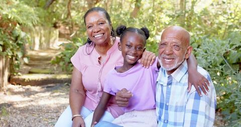 Happy Multigenerational African American Family Enjoying Outdoor Park