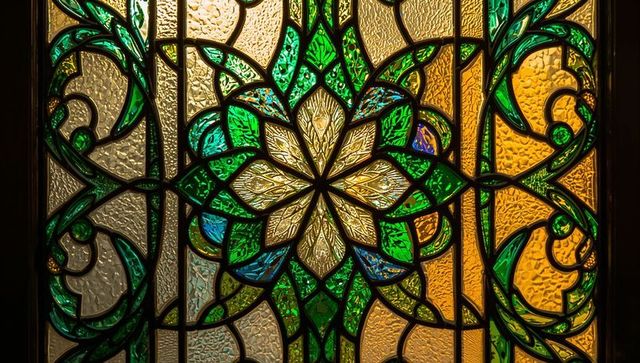 Intricate stained glass design with central star motif