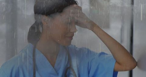 Stressed nurse under stormy clouds, highlighting mental health concerns